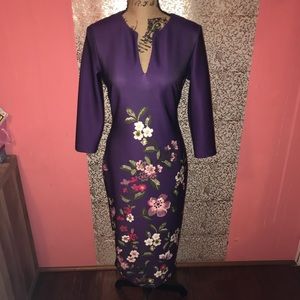 Purple floral midi long sleeve dress.